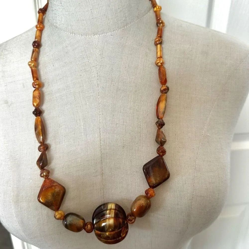 Orange swirl beaded long necklace